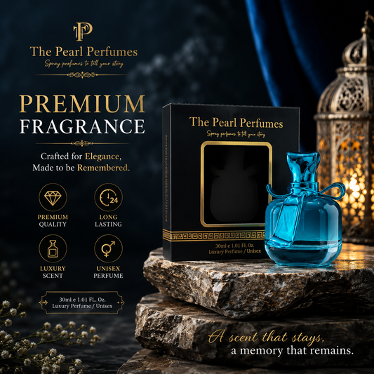 The Pearl Perfumes Premium Fragrance advertisement showing a black rectangular box and a translucent blue perfume bottle placed on stacked stone blocks, with decorative lanterns and smoke in the background. Text on the left reads 'PREMIUM FRAGRANCE' and includes product claims and scent descriptors.